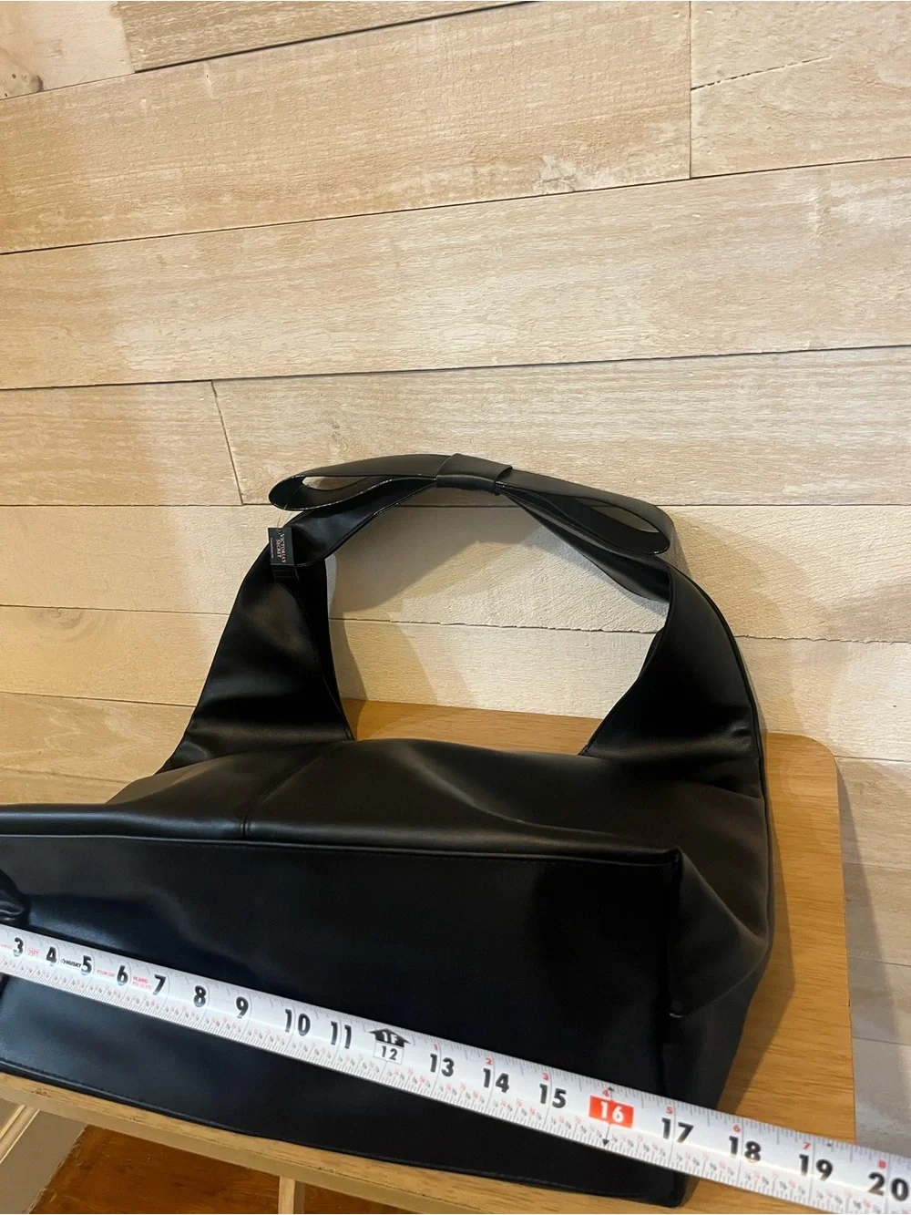 Victoria's Secret Black Leather Shoulder Hobo with Gold Logo Bow Strap